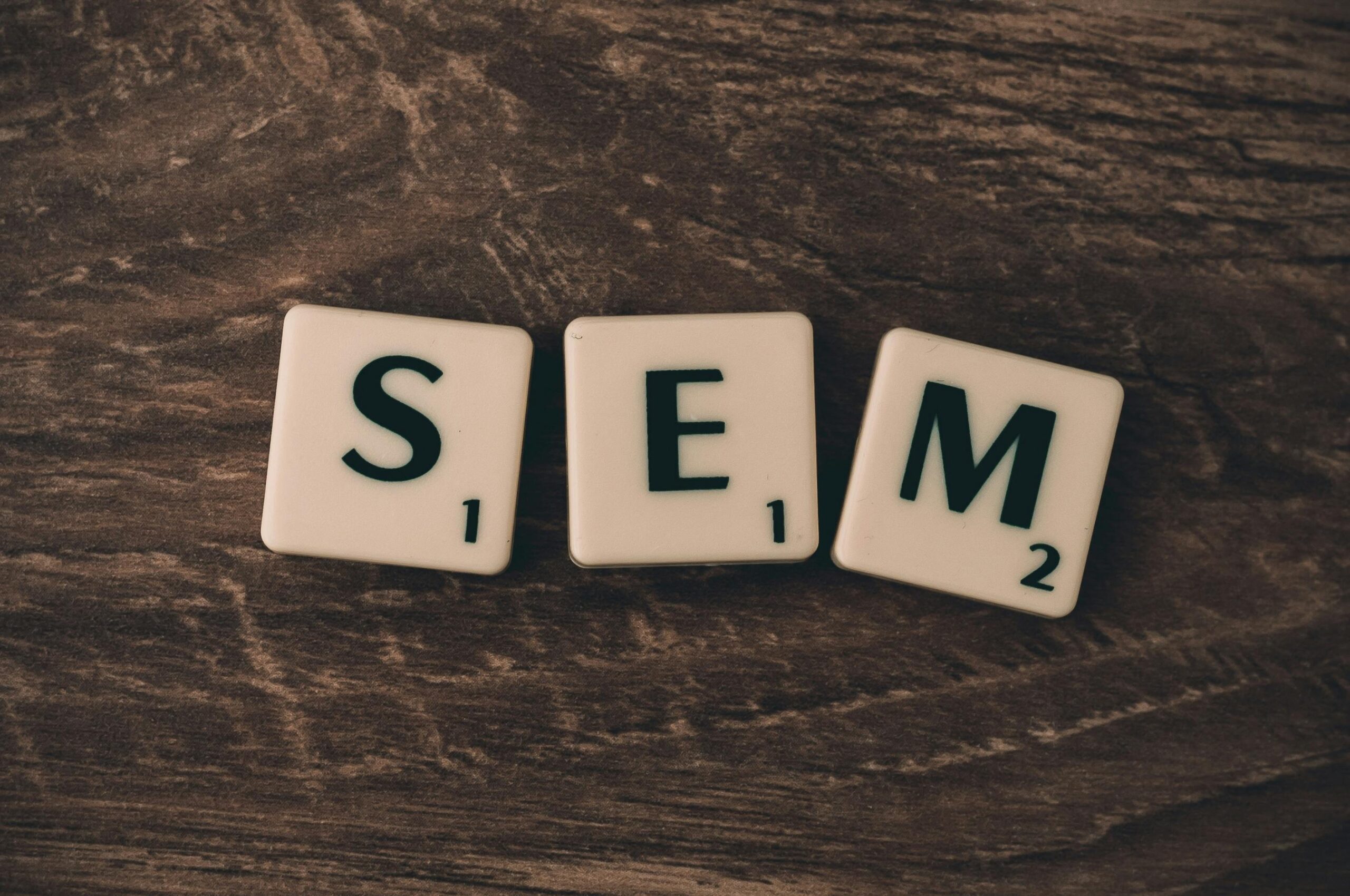 the letters "SEM"